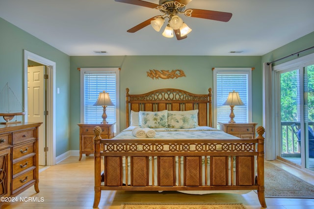 1981 New River Inlet Rd, North Topsail Beach, NC 28460 - bedroom featuring light wood-type flooring and access to exterior