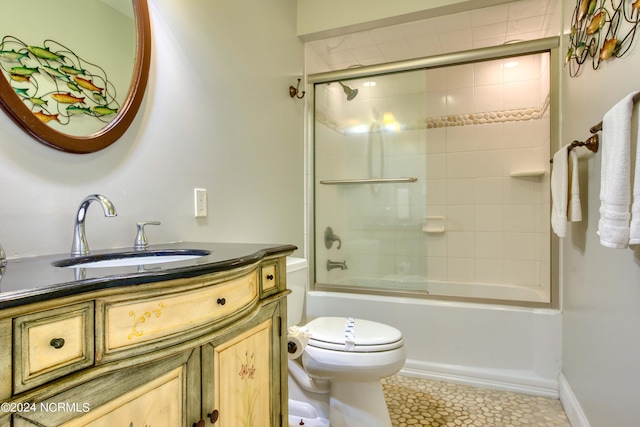 1981 New River Inlet Rd, North Topsail Beach, NC 28460 - full bathroom featuring vanity, shower / bath combination with glass door, and tile patterned floors