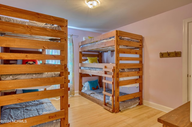 1981 New River Inlet Rd, North Topsail Beach, NC 28460 - bedroom featuring wood finished floors and baseboards