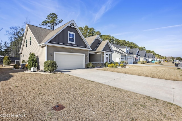 view of front facade with a garage and a front yard