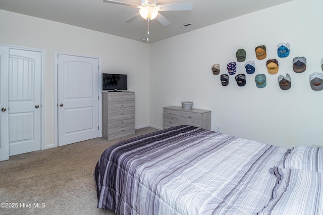 bedroom featuring light carpet and ceiling fan