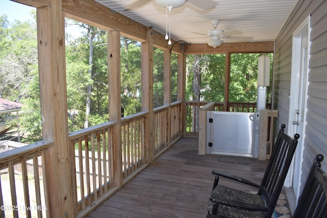 7304 E Oak Island Dr, Oak Island, NC 28465 - deck featuring ceiling fan