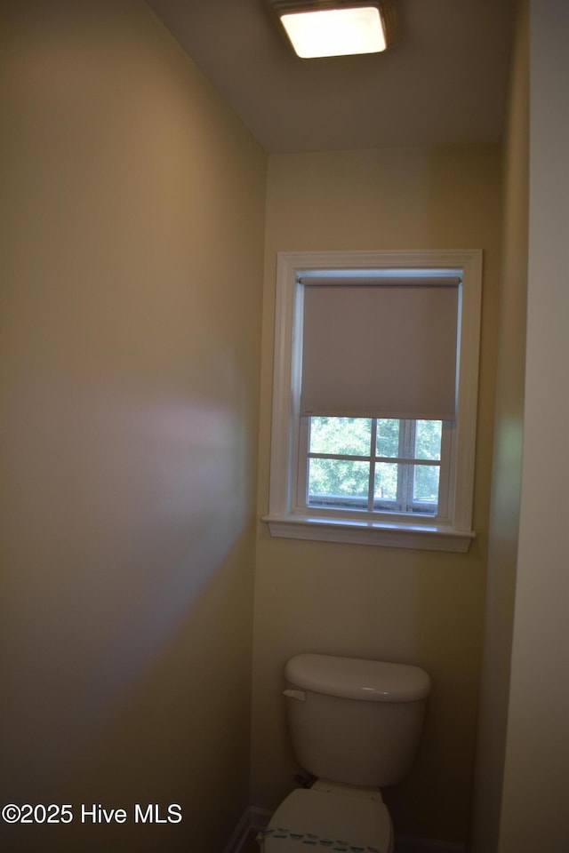 7304 E Oak Island Dr, Oak Island, NC 28465 - bathroom featuring toilet