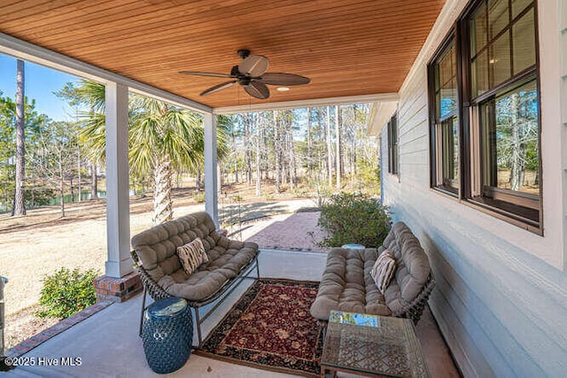 view of patio featuring ceiling fan