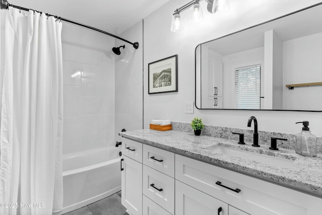 bathroom with vanity, tile patterned flooring, and shower / bath combo