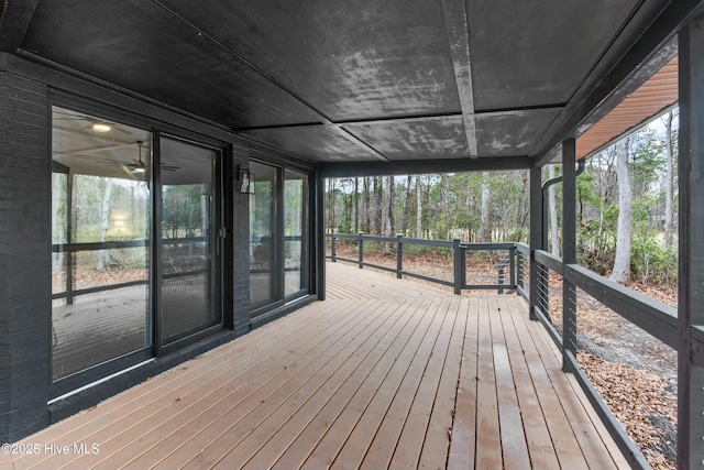 unfurnished sunroom with a wealth of natural light