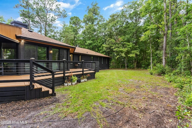 view of yard featuring a deck