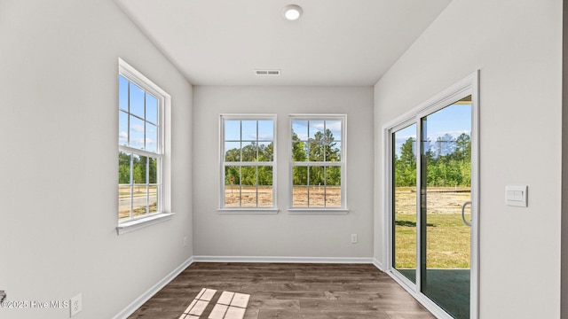 unfurnished sunroom with a healthy amount of sunlight