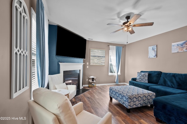 300 William Sharp Way, Jacksonville, NC 28546 - living area with wood finished floors, a ceiling fan, a fireplace with flush hearth, and baseboards