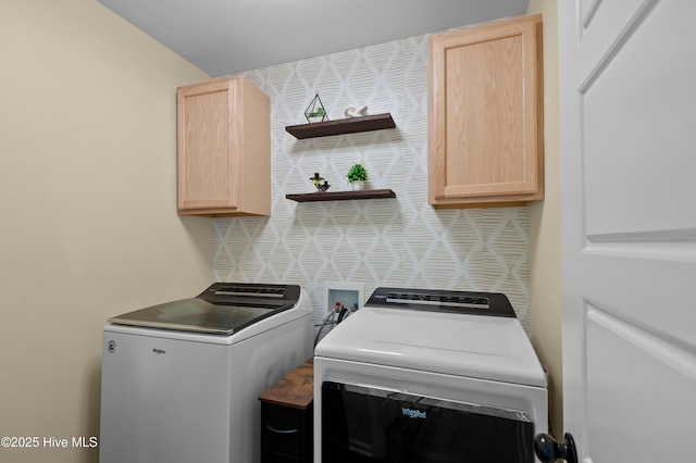 300 William Sharp Way, Jacksonville, NC 28546 - laundry area featuring washer and clothes dryer and cabinet space
