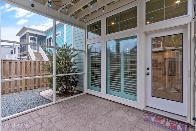 view of unfurnished sunroom