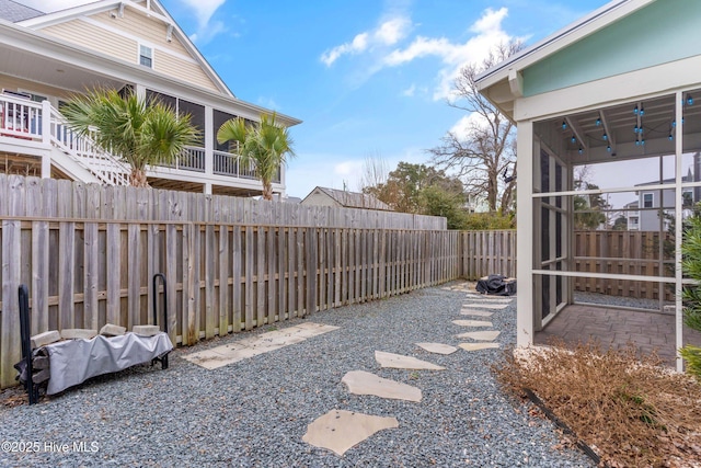 view of yard with a fenced backyard and a patio area