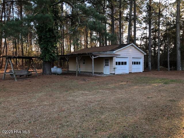 exterior space with a garage