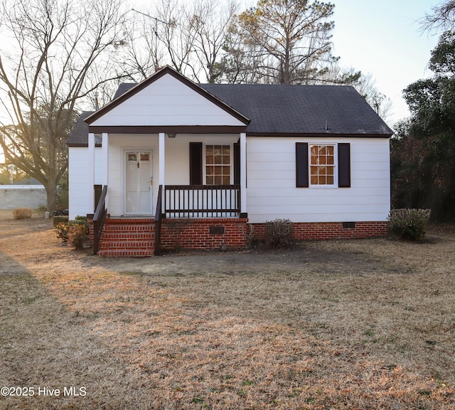 view of front of home with a front lawn and a porch