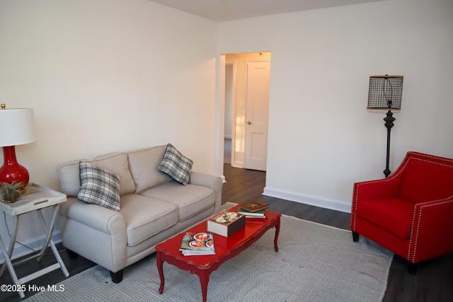 living room with dark wood-type flooring