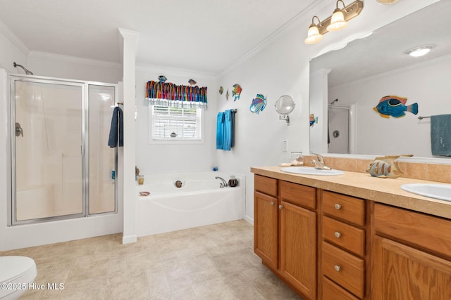 full bathroom featuring vanity, crown molding, toilet, and separate shower and tub