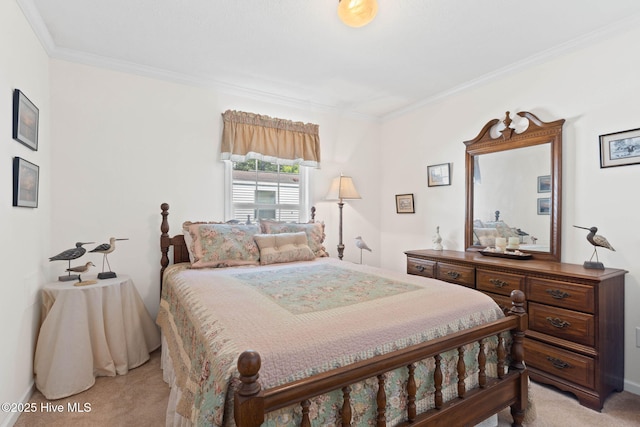 carpeted bedroom with ornamental molding