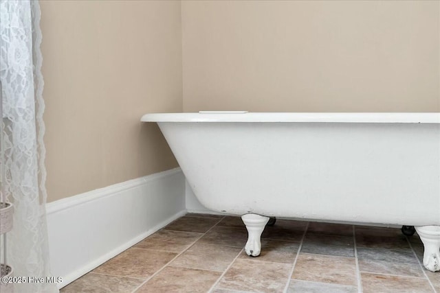 bathroom with a freestanding bath