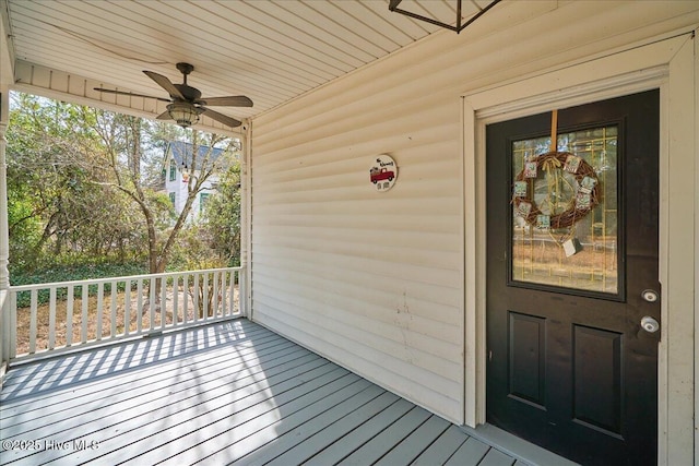 wooden deck with ceiling fan