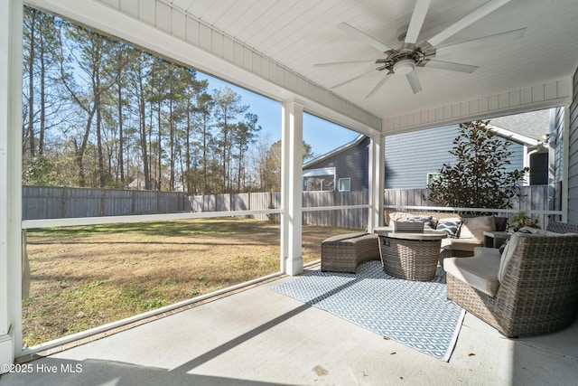 sunroom / solarium with ceiling fan