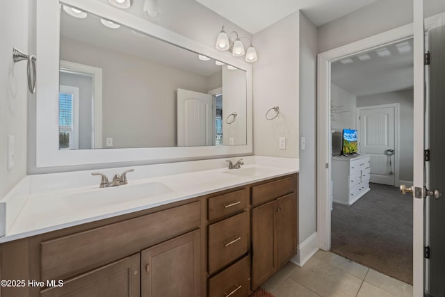 bathroom with vanity and tile patterned floors