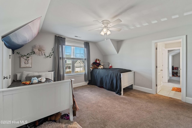 carpeted bedroom featuring ceiling fan and lofted ceiling