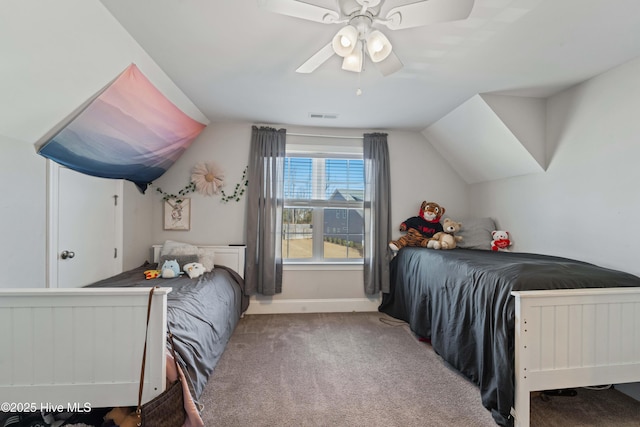 bedroom featuring vaulted ceiling, ceiling fan, and carpet floors