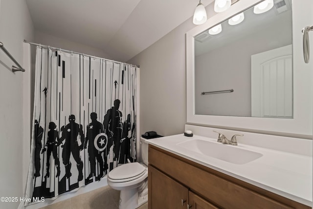 bathroom with vanity, curtained shower, tile patterned floors, and toilet