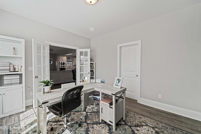 office featuring dark wood-type flooring and french doors