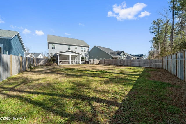 view of yard with a sunroom