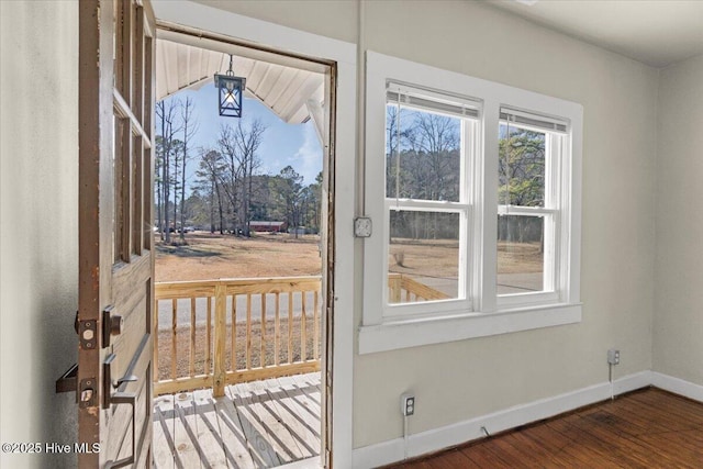 doorway with wood-type flooring