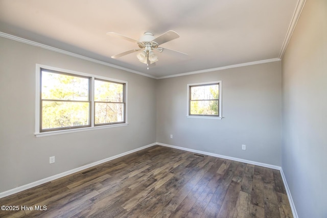 unfurnished room featuring ornamental molding, dark wood-type flooring, and ceiling fan