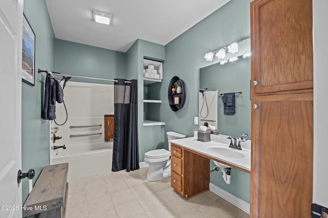 bathroom with a sink, toilet, and shower / bath combo