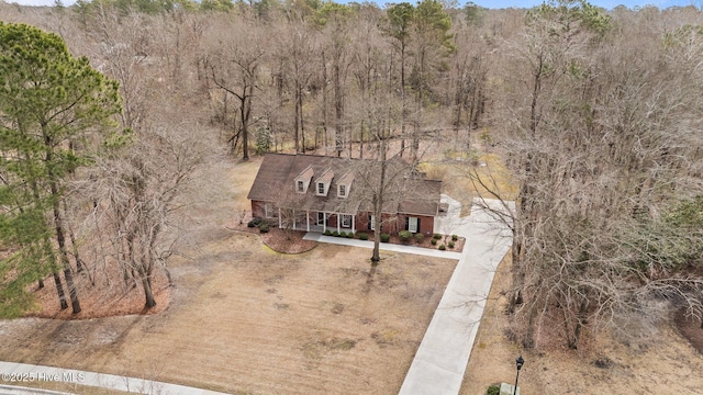 drone / aerial view with a view of trees