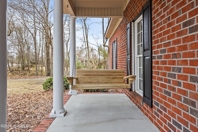 view of patio featuring a porch