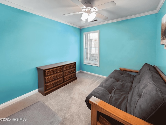 bedroom with crown molding, ceiling fan, and carpet flooring