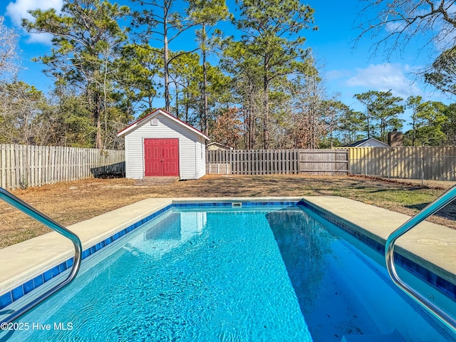 view of pool with a storage shed