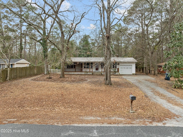 view of front of home with a garage and covered porch