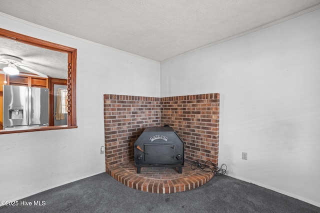 details with a textured ceiling, stainless steel fridge with ice dispenser, carpet, and a wood stove