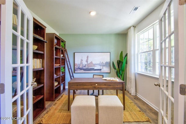 office space featuring wood-type flooring and french doors