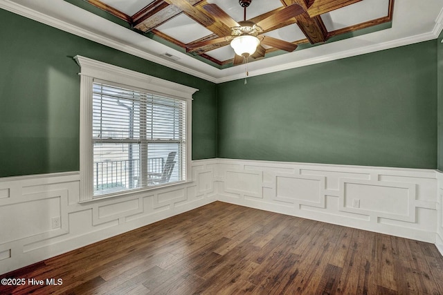 unfurnished room featuring coffered ceiling, ornamental molding, dark wood-type flooring, and ceiling fan