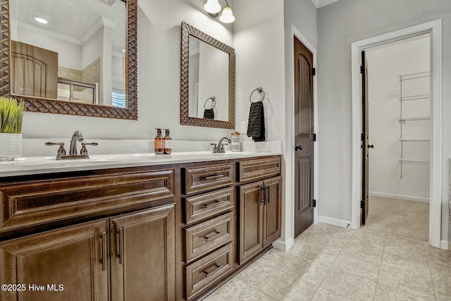 bathroom featuring vanity and a shower with shower door