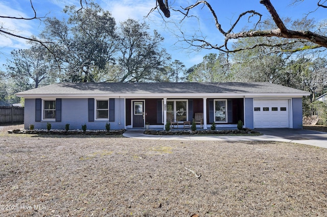 ranch-style home featuring a garage and a porch