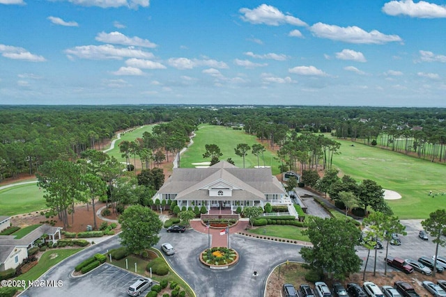 bird's eye view featuring a forest view