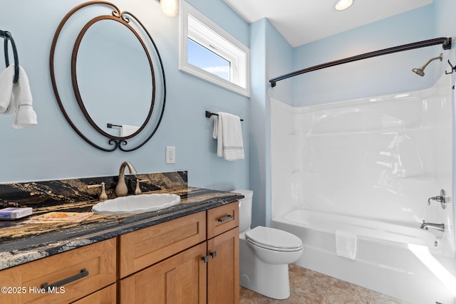 full bath with toilet, vanity, and shower / tub combination