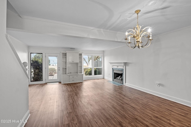 unfurnished living room with a fireplace, ornamental molding, and wood-type flooring