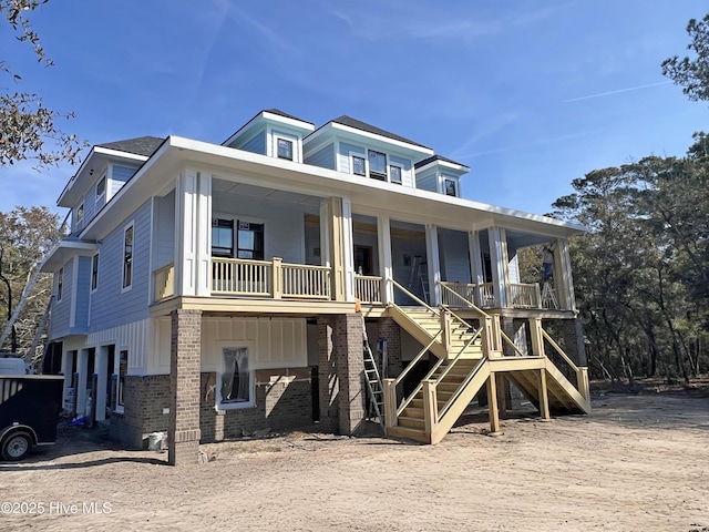 view of front of property featuring covered porch