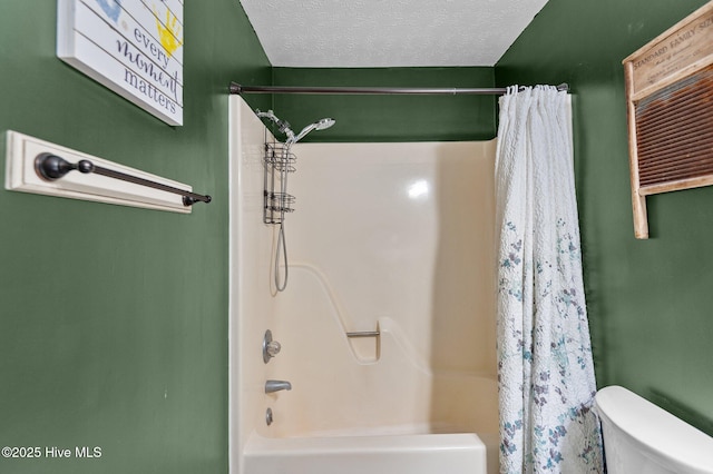 bathroom with shower / tub combo with curtain, toilet, and a textured ceiling