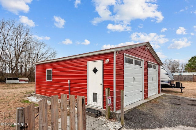 view of outdoor structure featuring a garage