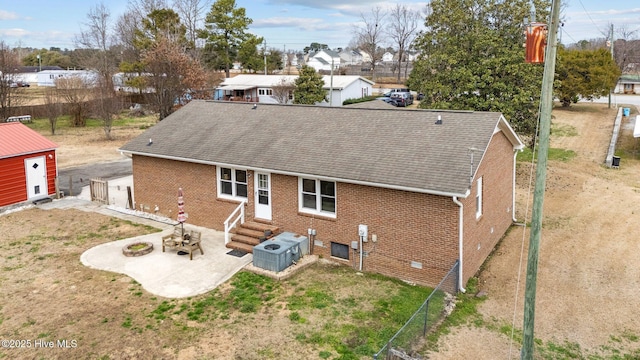 back of property featuring a patio